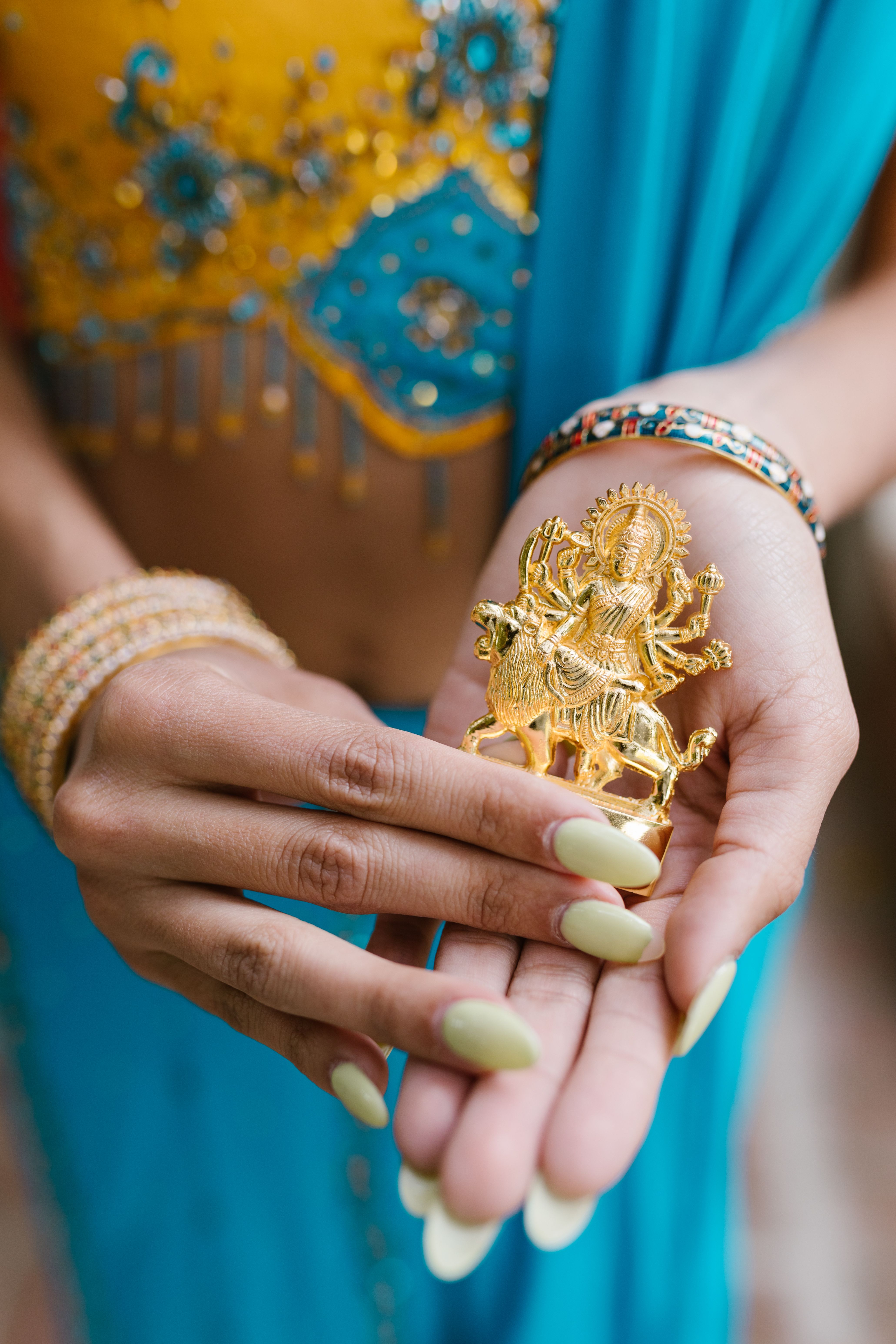 Tata Capital logo and image representing gold and finance, signifying entry into the gold loan market.