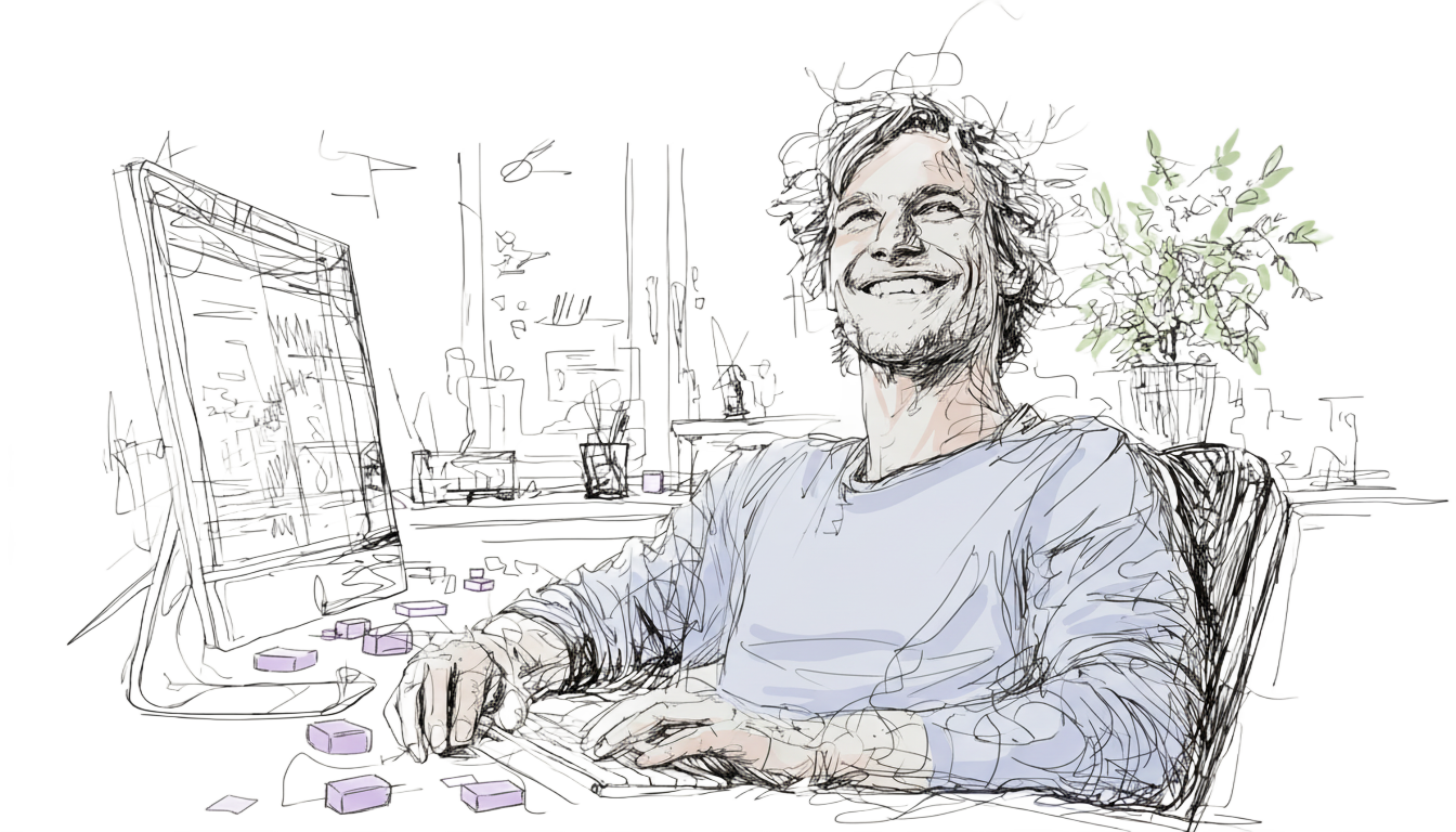 Smiling person in blue shirt at a desk with a keyboard. Background shows a plant and computer screen.