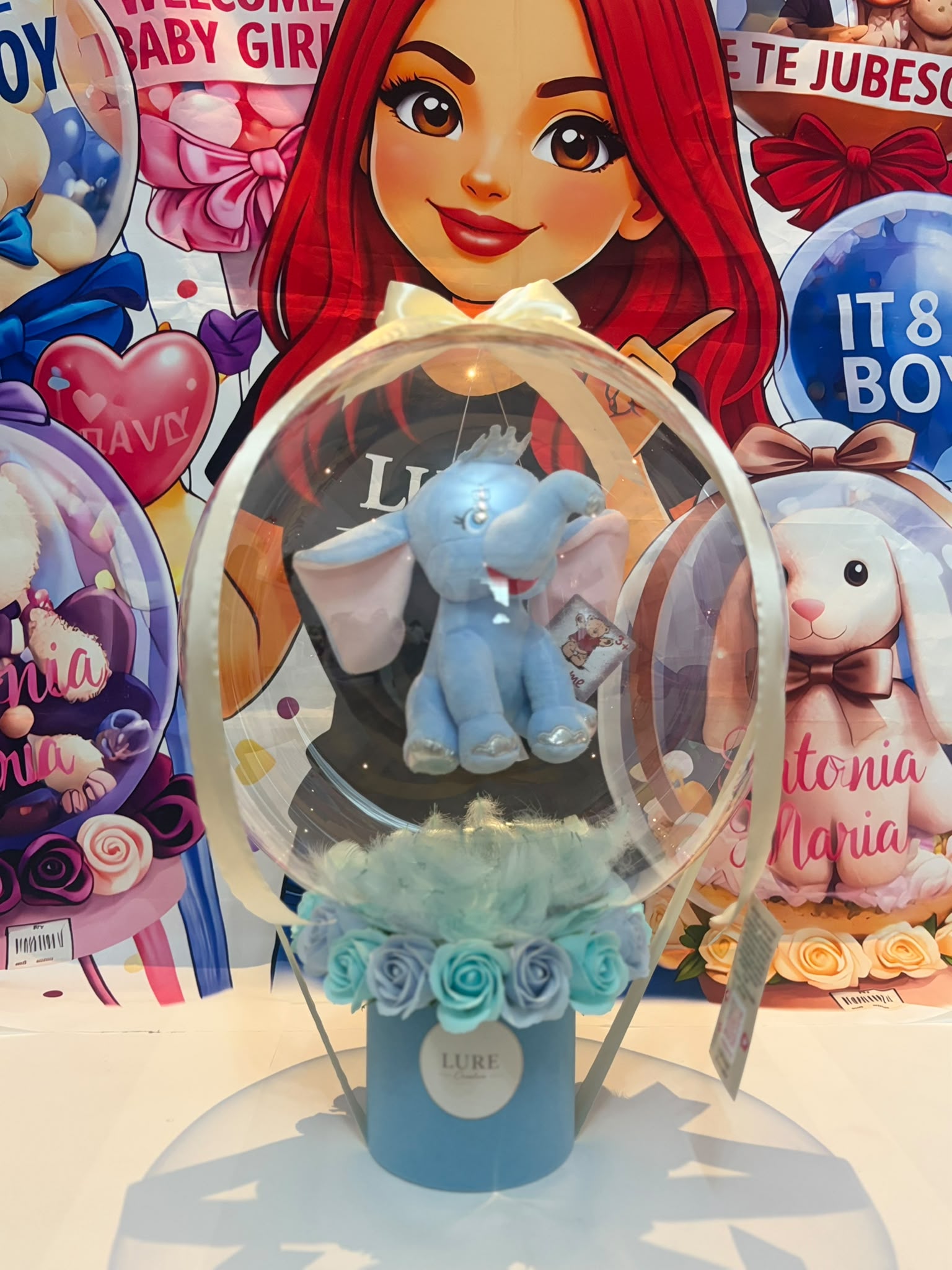 BoBo balon transparent cu elefantel de plus albastru si trandafiri pastel