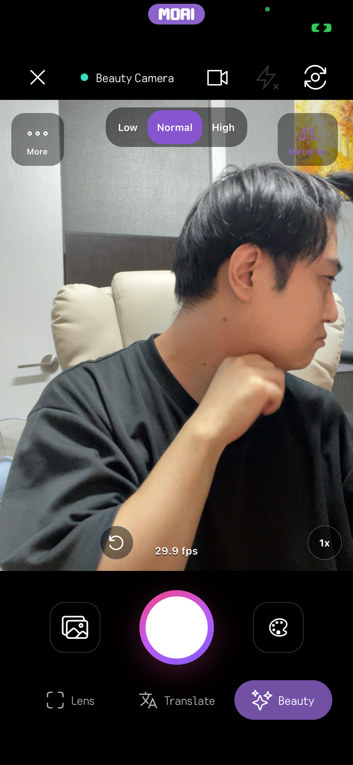 Lens, Translate 옆에서 Beauty 모드가 선택된 Beauty Camera 홈 화면으로, Low, Normal, High 화질 옵션과 실시간 카메라 화면이 보입니다.