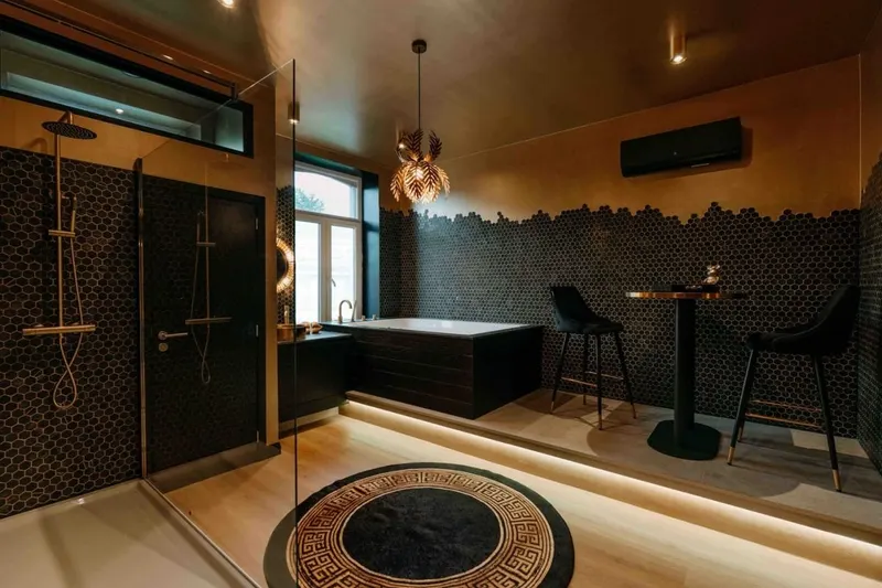 Suite Versace du Designer Hotel à Heusy — balnéo XL et wellness programmé à Heusy