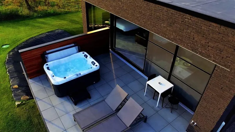 Loft Oduo à Sart-lez-Spa — 140 m², jacuzzi extérieur et sauna sur les Fagnes à Sart-lez-Spa