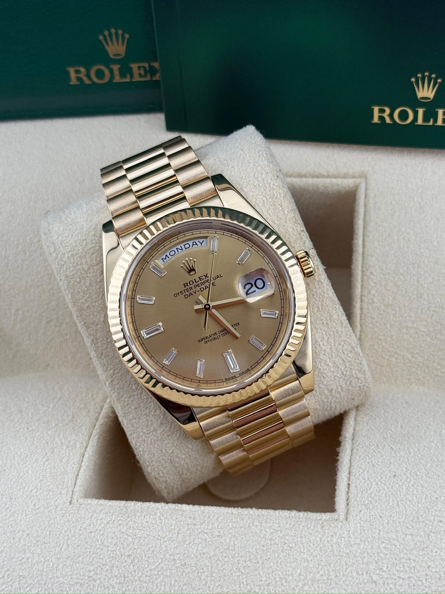 Rolex Daydate 40mm champagne baguette dial 228238