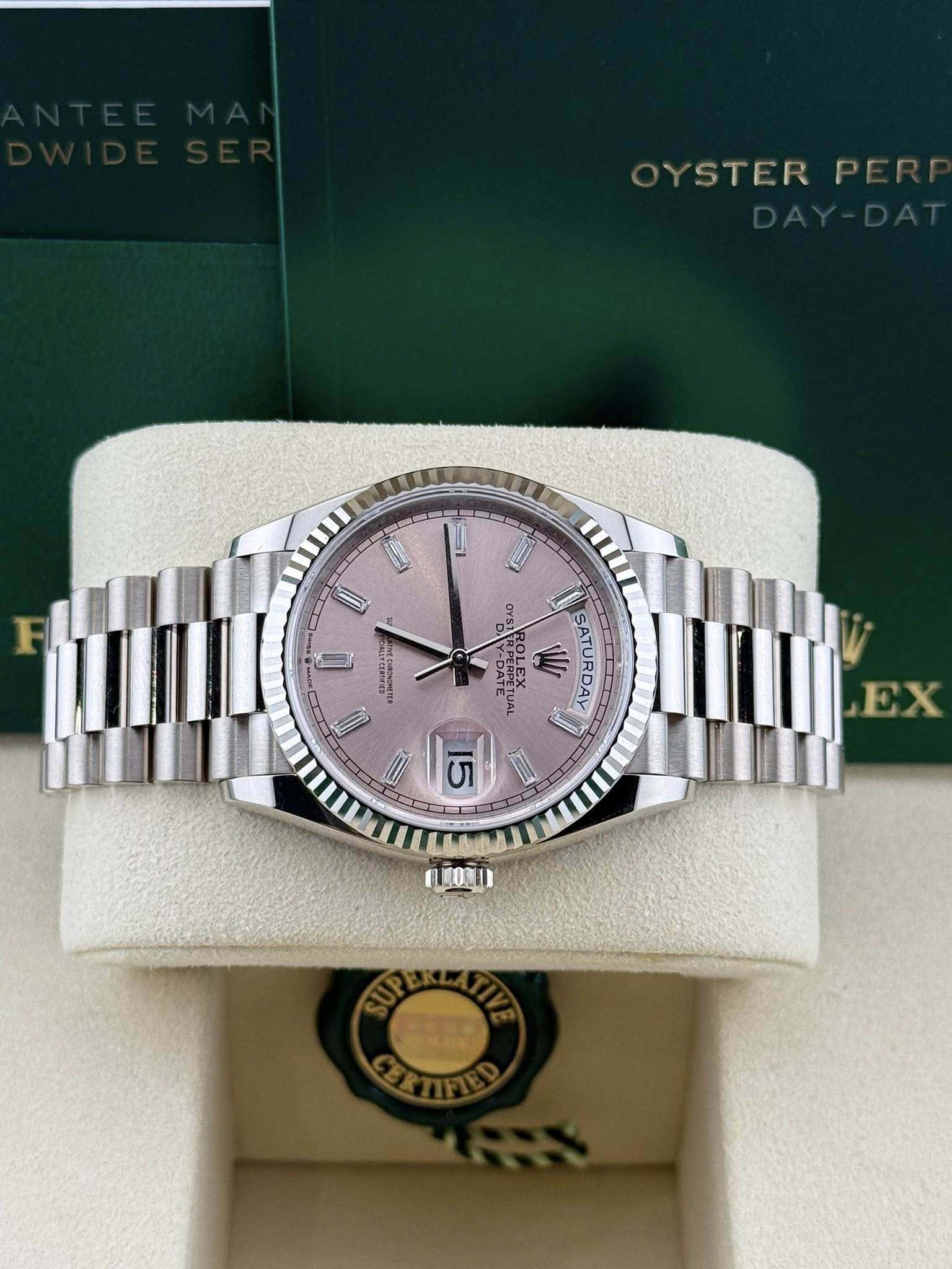 Rolex Daydate 36mm white gold pink baguette dial 128239