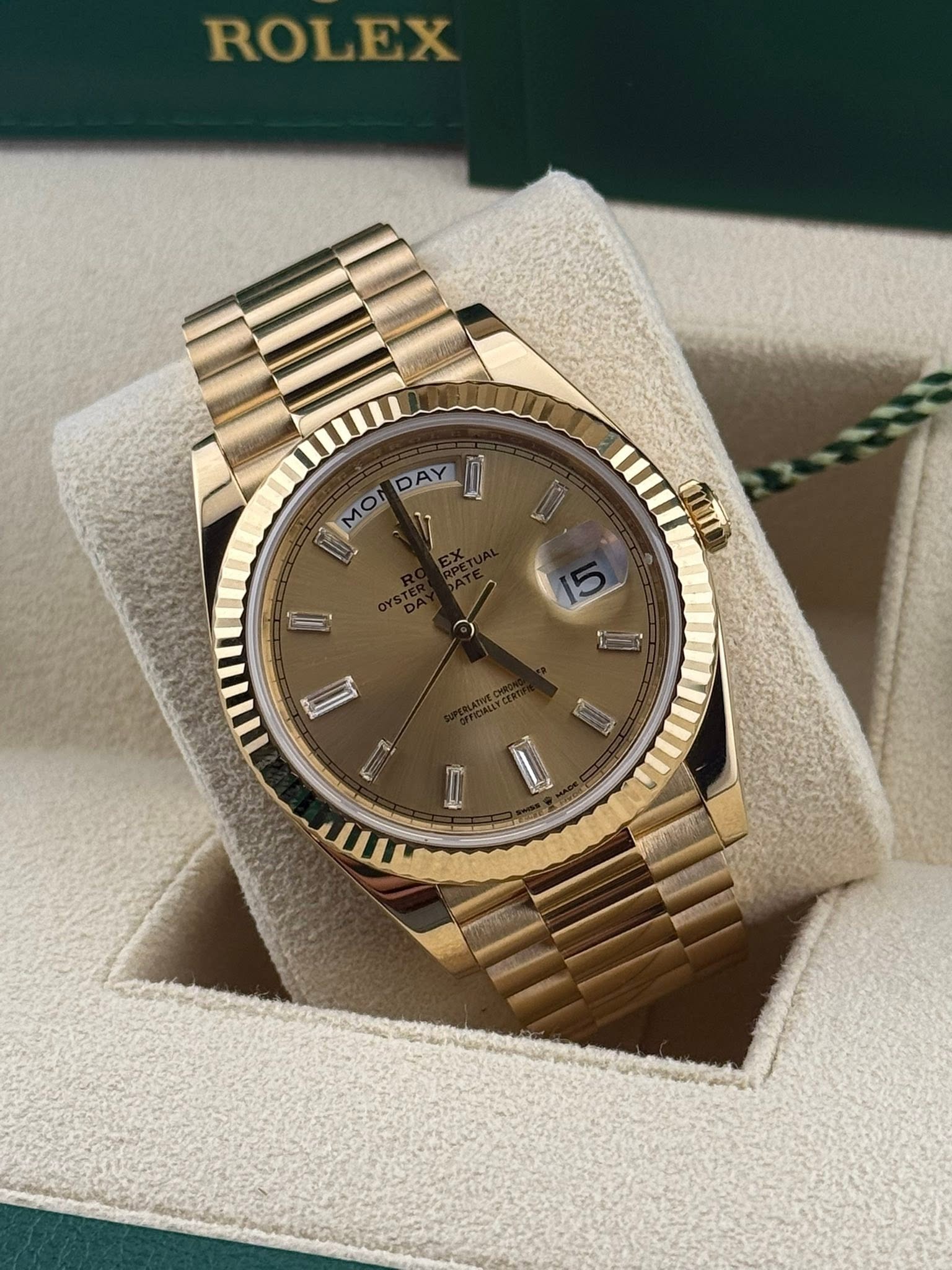 Rolex Daydate 40 Champagne Baguette Dial 228238