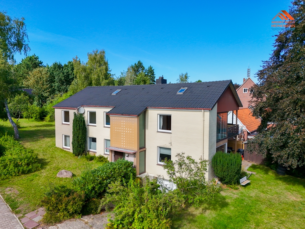 Klug investieren & wohnen: Gepflegtes Zweifamilienhaus mit 1.212 m² Grundstück in Cuxhaven! – Ansicht 1