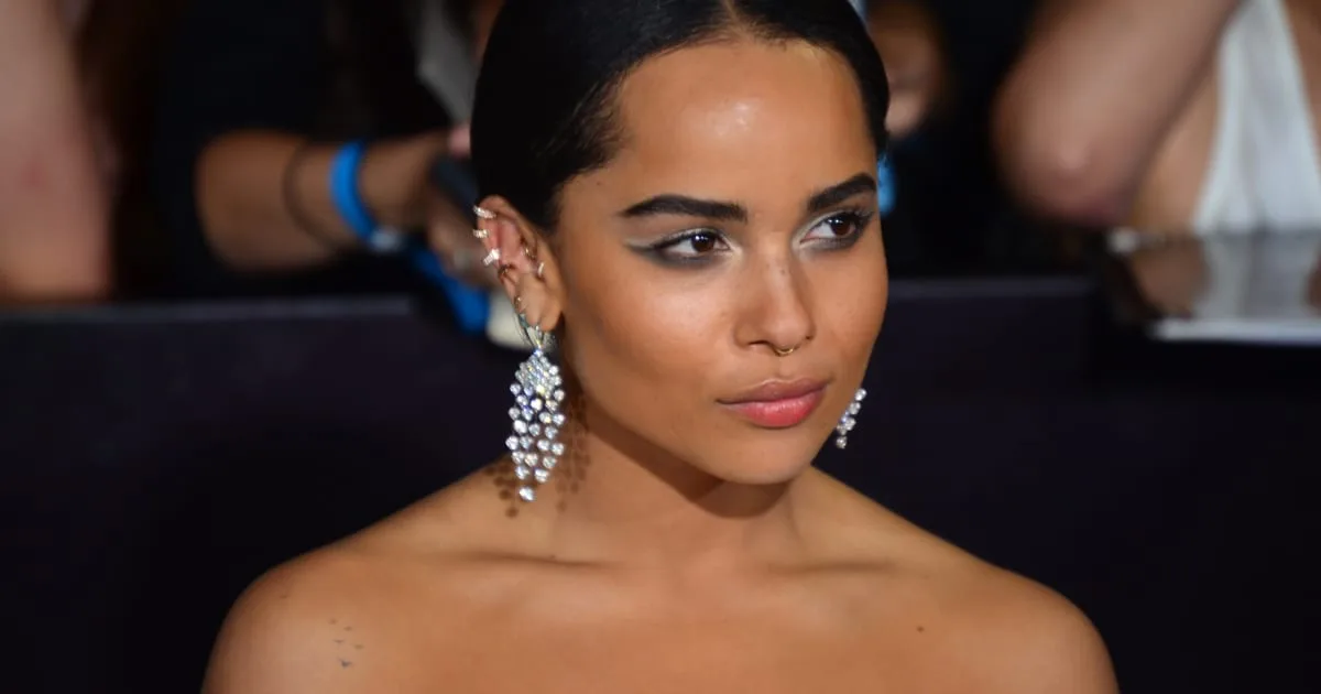 Zoe Kravitz wows in barely there lace slip dress as she joins co-star Austin Butler at Caught Stealing Paris premiere - as they continue to spark romance rumours