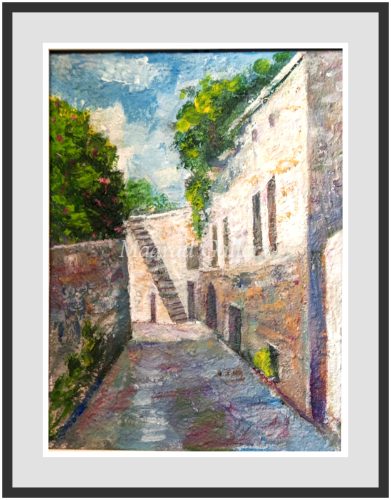 A narrow passage and old houses in the town of Baakline
