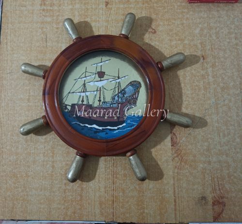 A handcrafted antique ship with a unique frame – a one-of-a-kind nautical artwork