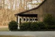 The Barn at Rock Creek logo