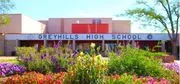 Greyhills Academy High School logo