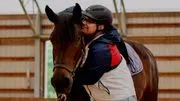 Rainbow Therapeutic Riding Center logo