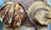 Rising Above Bakery logo
