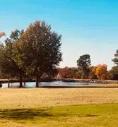 Oaks Country Club logo
