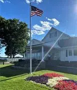 Shore & Country Club logo