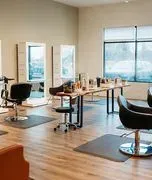 Total Knockout Salon & Spa logo
