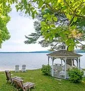 The Lake House At Ferry Point Inn logo