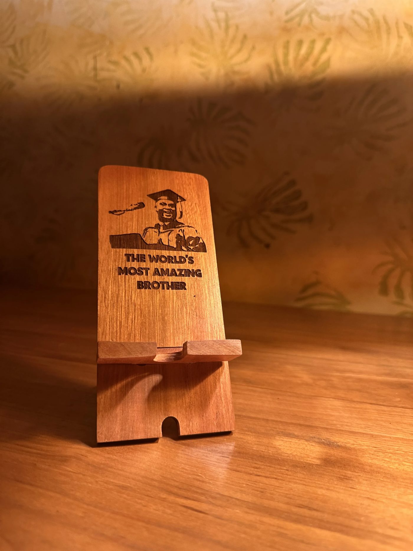 Wooden Phone stand for your Favorite brother — handcrafted wood by Mahogana in Accra, Ghana