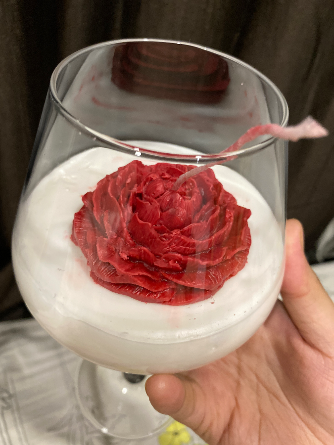 Rose candle in wine glass — image 2