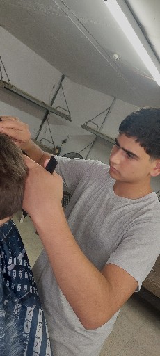 הפרופיל של Neriya Barber