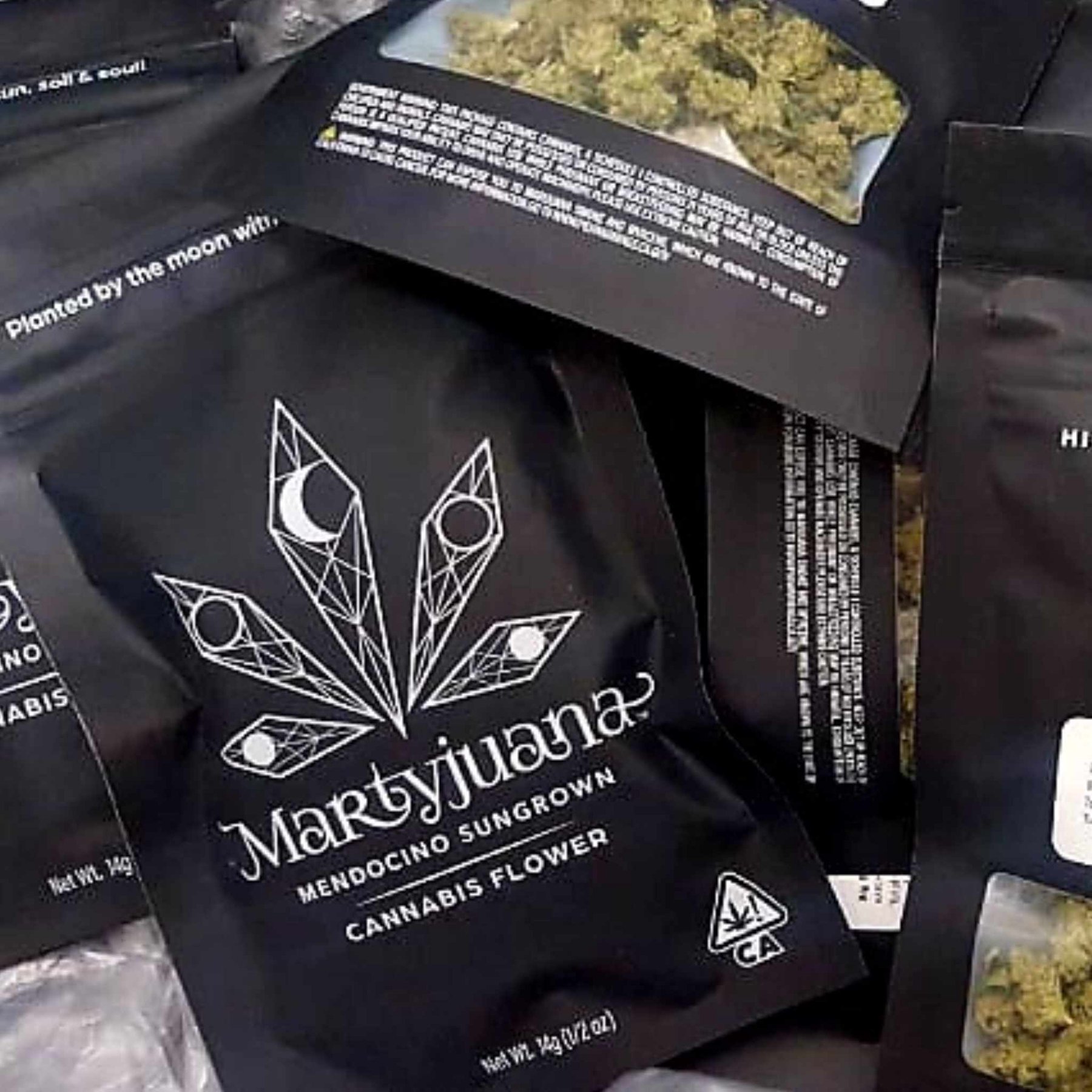 Black Martyjuana flower pouches with moon-phase leaf logos