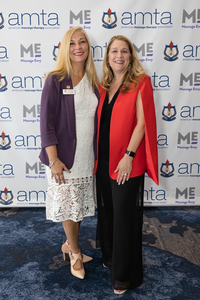 AMTA President Michaele Colizza (left) and Vice President of National Operations for Massage Envy, Diane Cooley, at the Closing Reception sponsored by Massage Envy.