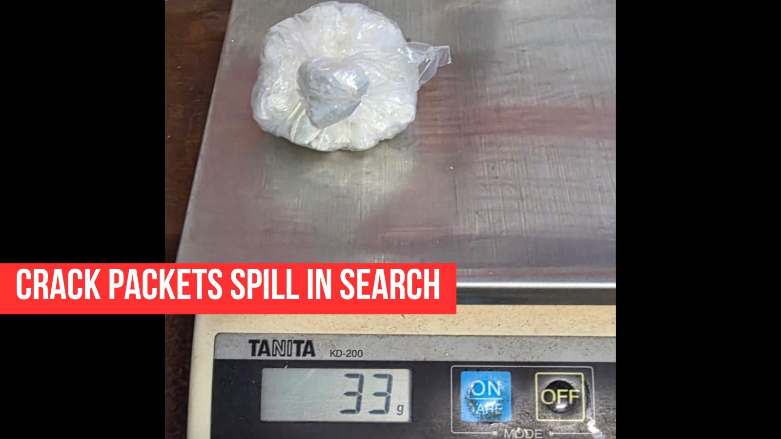 Crack baggies spill from suspect’s body after taped up stash bursts open during Boston jailhouse booking