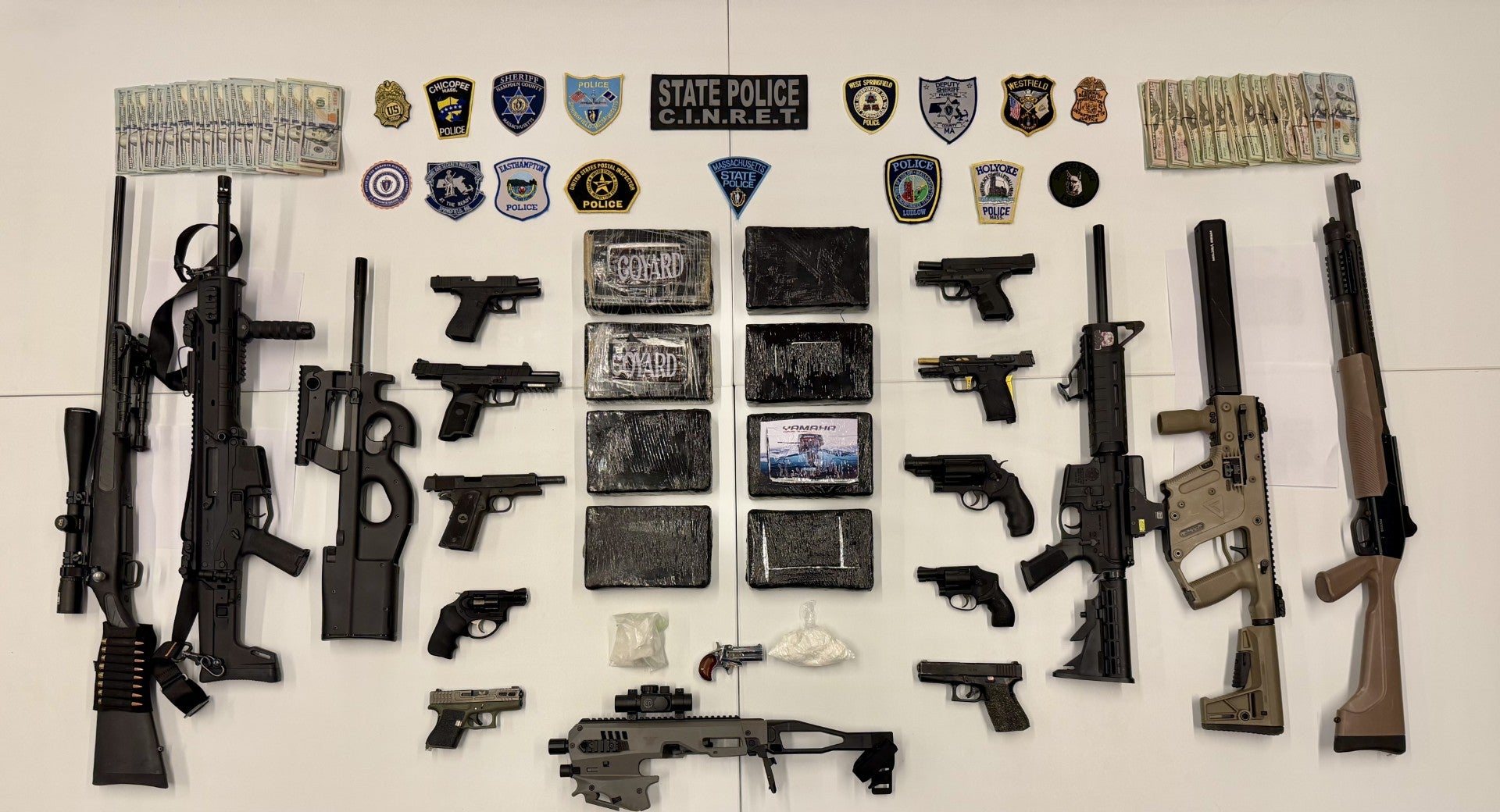 Six arrested as police seize massive arsenal and drug stash in Springfield trafficking busts