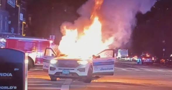 Boston police cruiser engulfed in flames