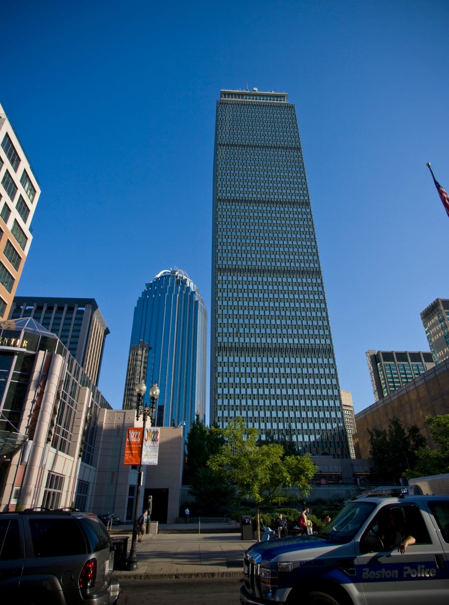 The Prudential Tower in Boston with a Boston Police cruiser