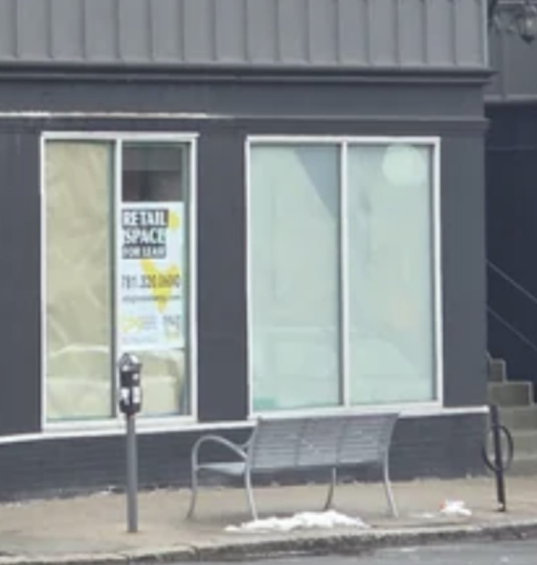 Vacant retail space near Copley Square with For Lease sign