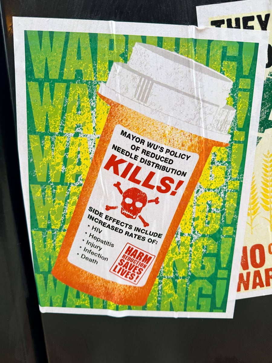Poster in the South End accusing Mayor Wu of killing people by reducing needle distribution