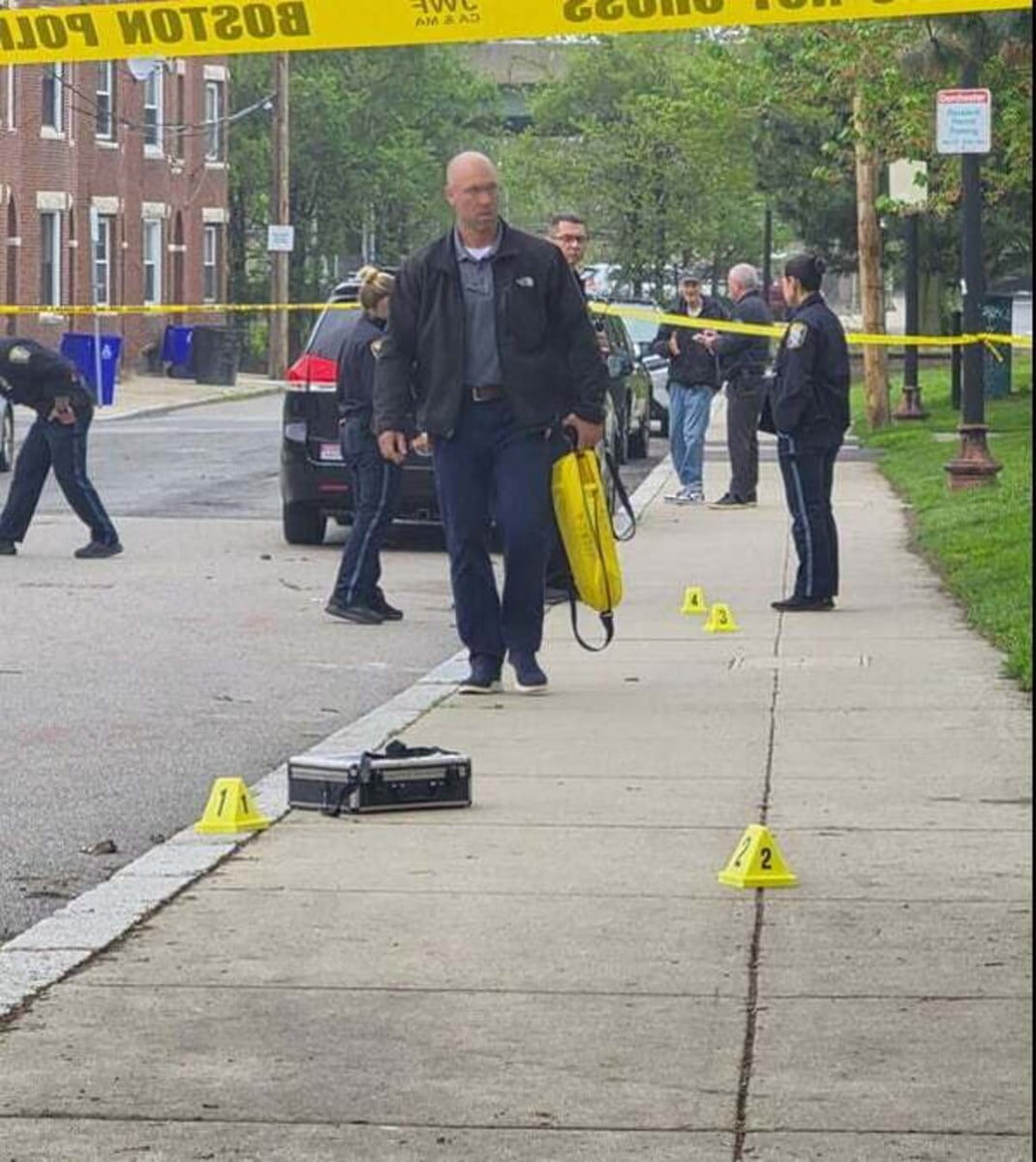 Boston Police evidence markers at the May 16 Dorchester Avenue shooting scene