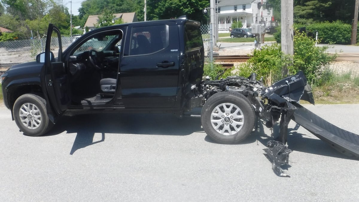 MBTA commuter rail train rips brand-new pickup in two at South Shore crossing after 20-year-old driver runs every flashing light, bell and gate