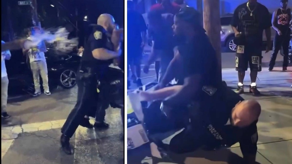 Boston cop forced to break up 150-person dirtbike mob by HIMSELF, pelted with trash and booze as critics say city's police is heavily understaffed