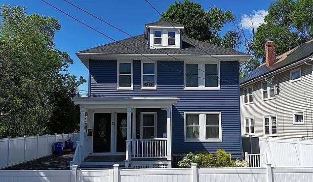 The two-story blue home at 25 Malta Street in Mattapan owned by Congresswoman Ayanna Pressley's husband Conan Harris.