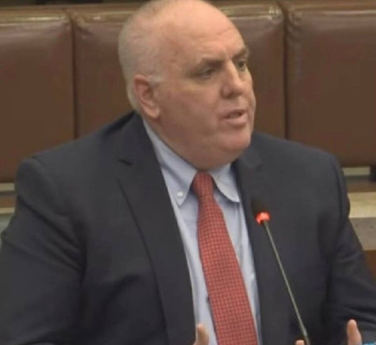 Boston City Councilor Ed Flynn speaking in the City Council chamber.
