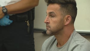 Boston Fire Lieutenant Joshua Thompson, 38, appears in court after being charged with 21 counts including drug trafficking and illegal firearms possession. (Boston25)