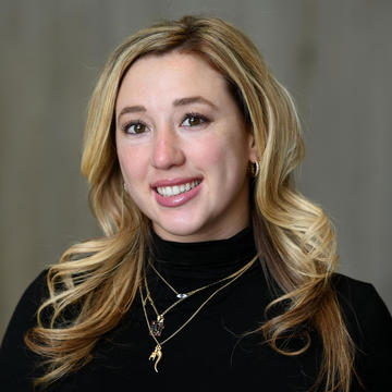 Deputy neighborhoods chief Ciara D’Amico was caught on viral video in a North End street melee — accused of hurling a high heel during the late-night fight.