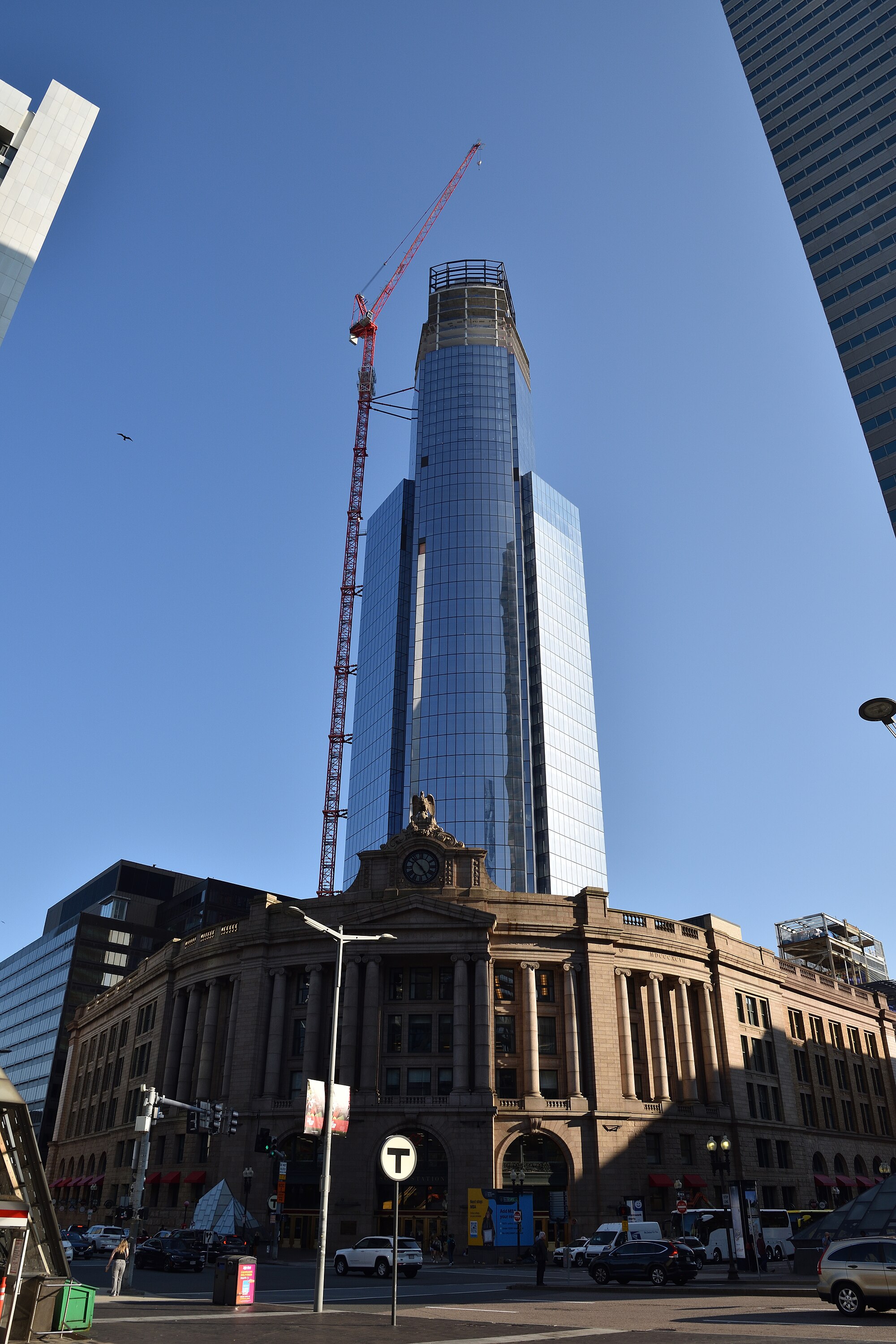 Every beam and pane of glass here comes from billionaire money, even as Wu riles up crowds against them.