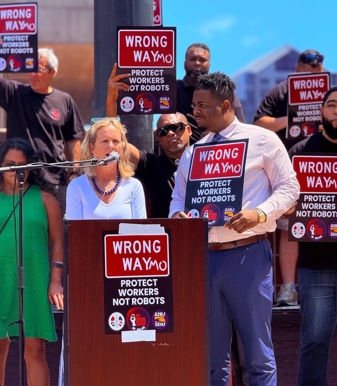 Councilors Henry Santana and Erin Murphy rally with unions outside City Hall — a made-for-camera moment. (Reddit)