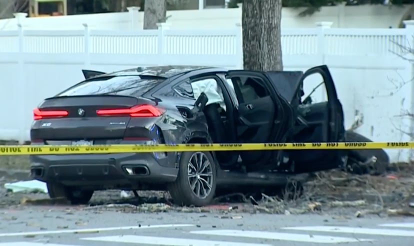 Woman, 45, killed after two-vehicle crash sends her car careening through residential fence before striking tree