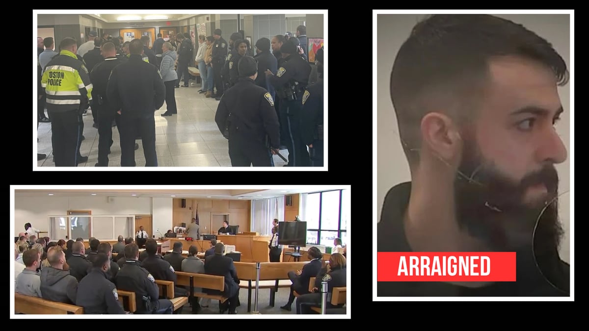 Boston police officers lined up outside Roxbury Municipal Court in support of Officer Nicholas O'Malley