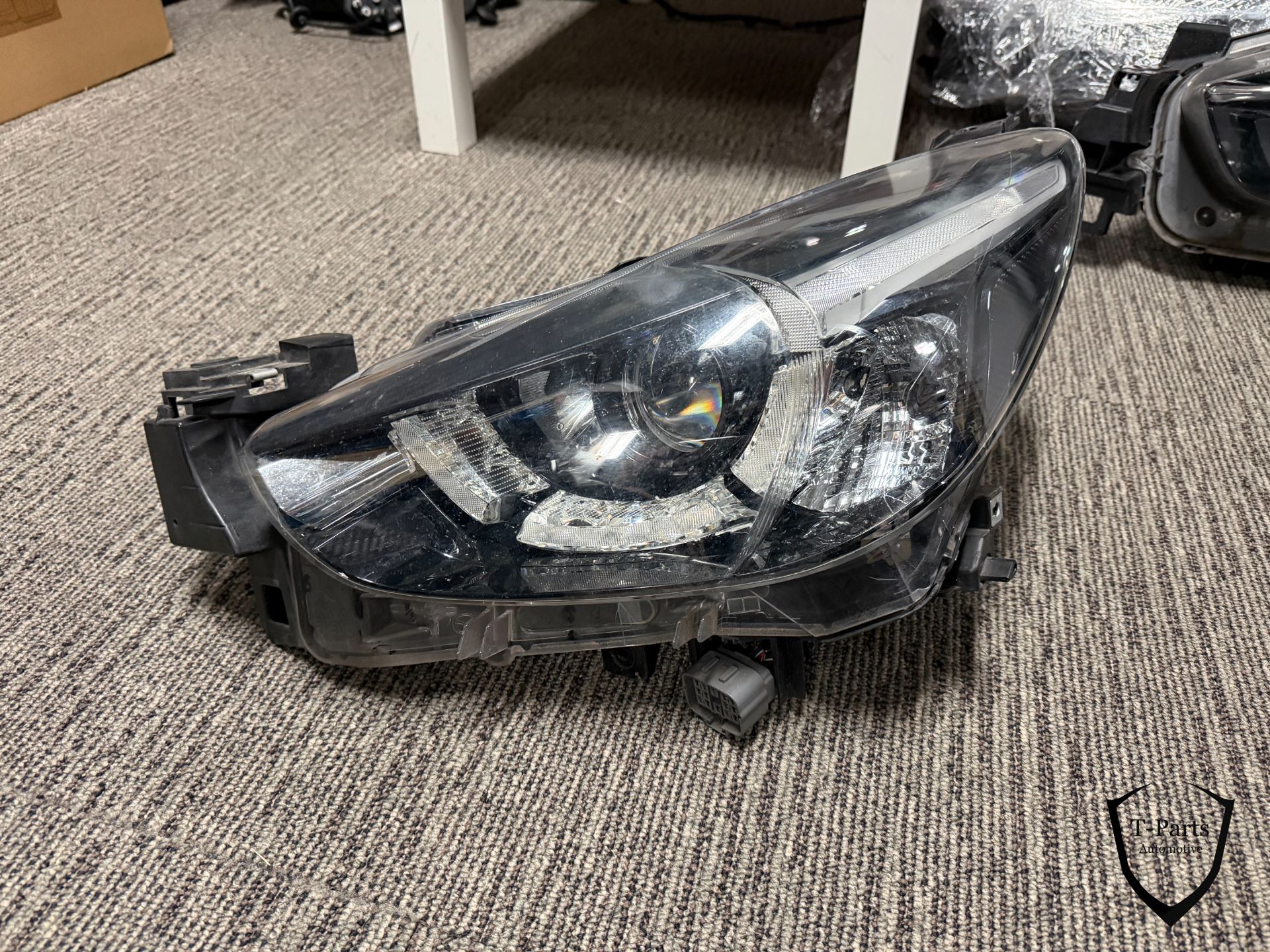 mazda 2 koplamp links DA6B51031f lamp