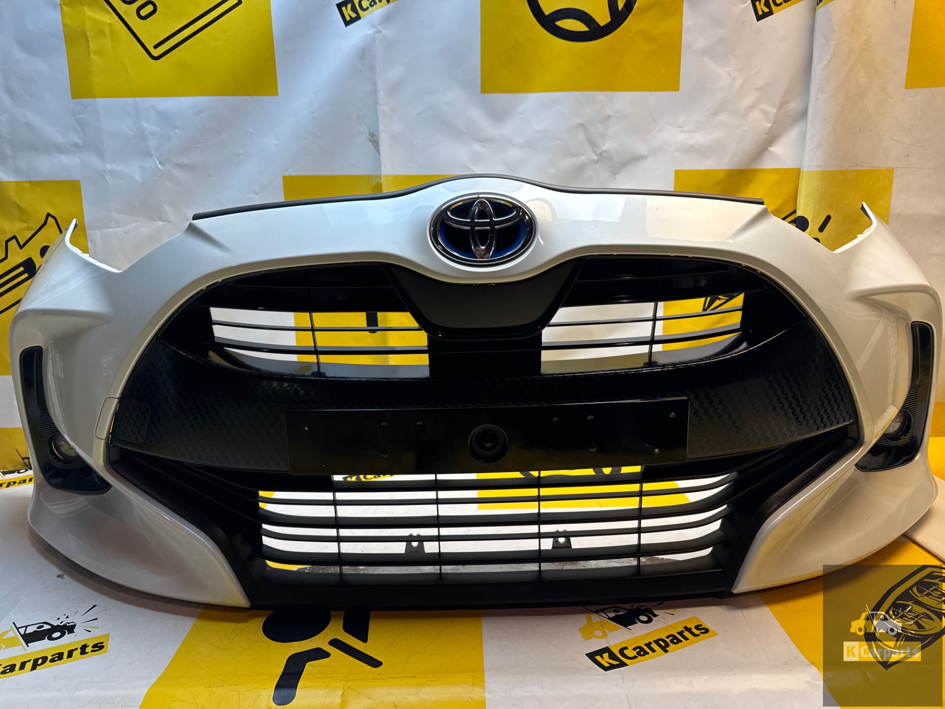 Pare-chocs Toyota Yaris Pare-chocs avant 52119-K0050 complètement neuf !