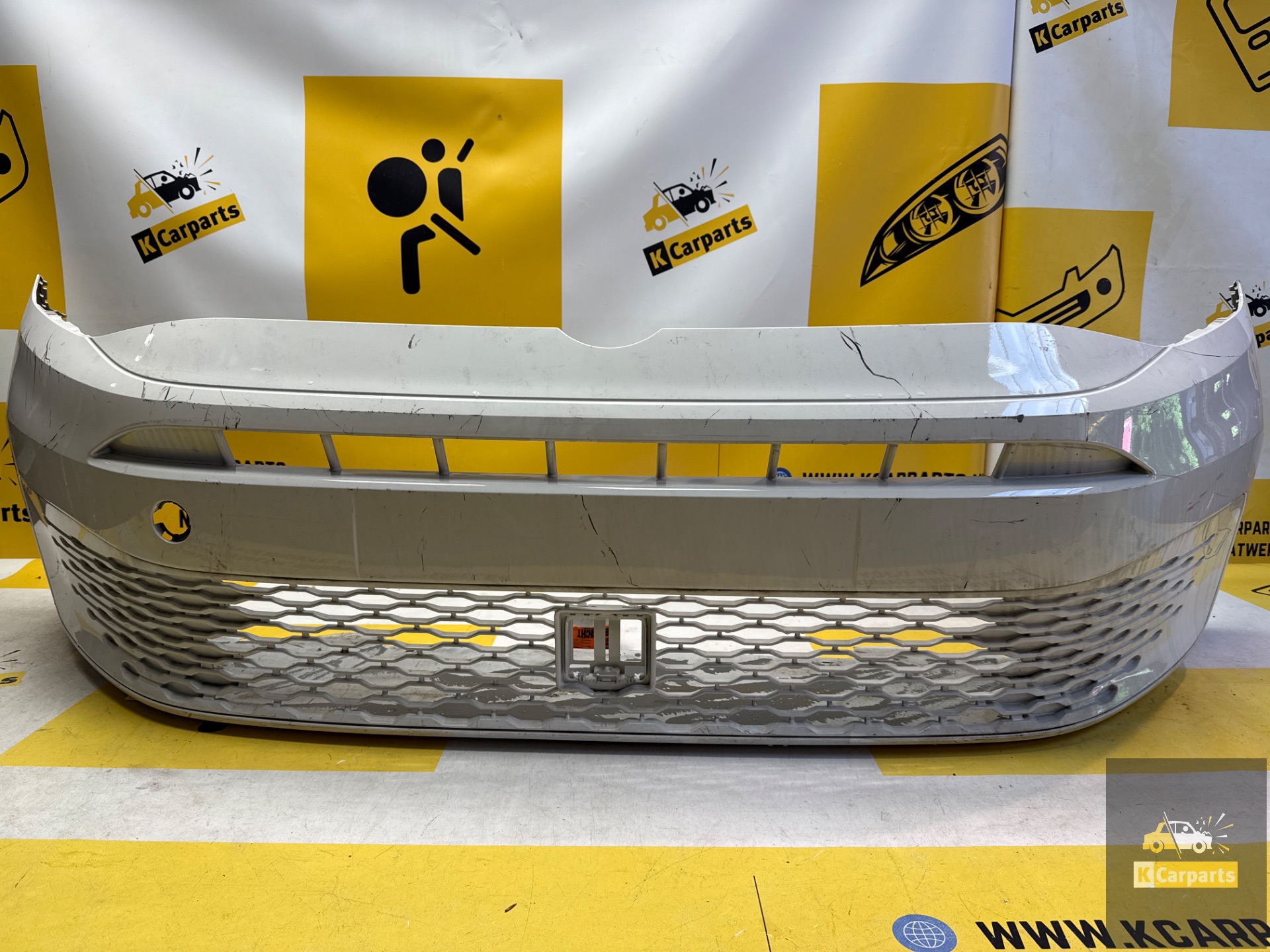 VOORBUMPER VW CADDY 2K7 BUMPER 2K7807221A Origineel