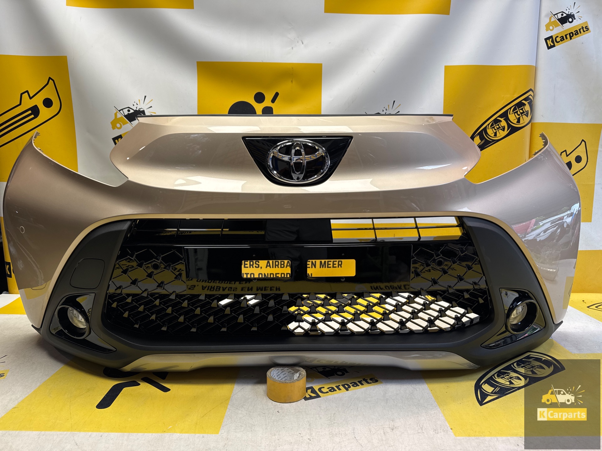 Toyota Aygo X Voorbumper origineel 52119-OH19 pdc compleet