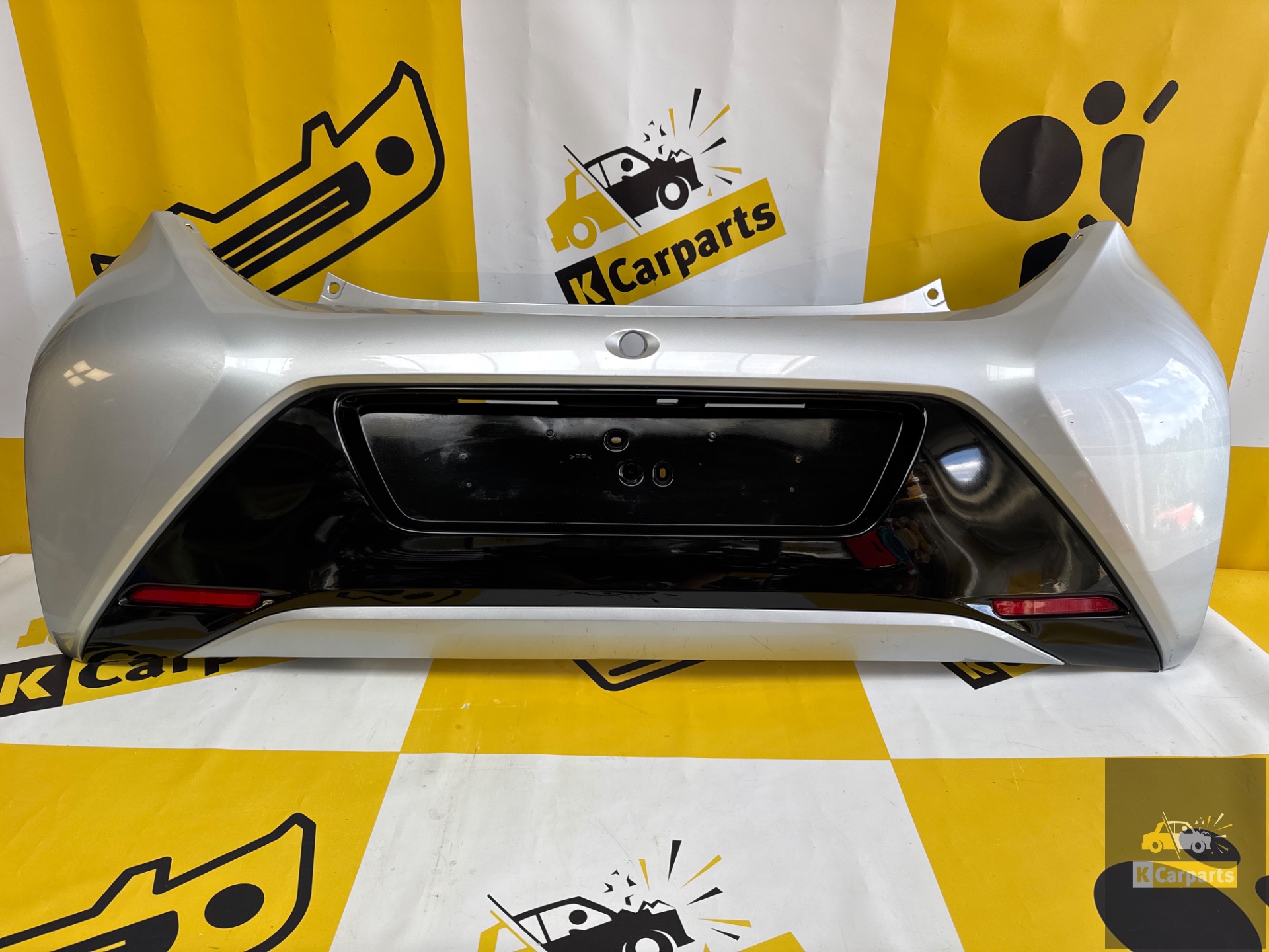 Toyota Aygo Heckstoßstange 52159-0H061 Original