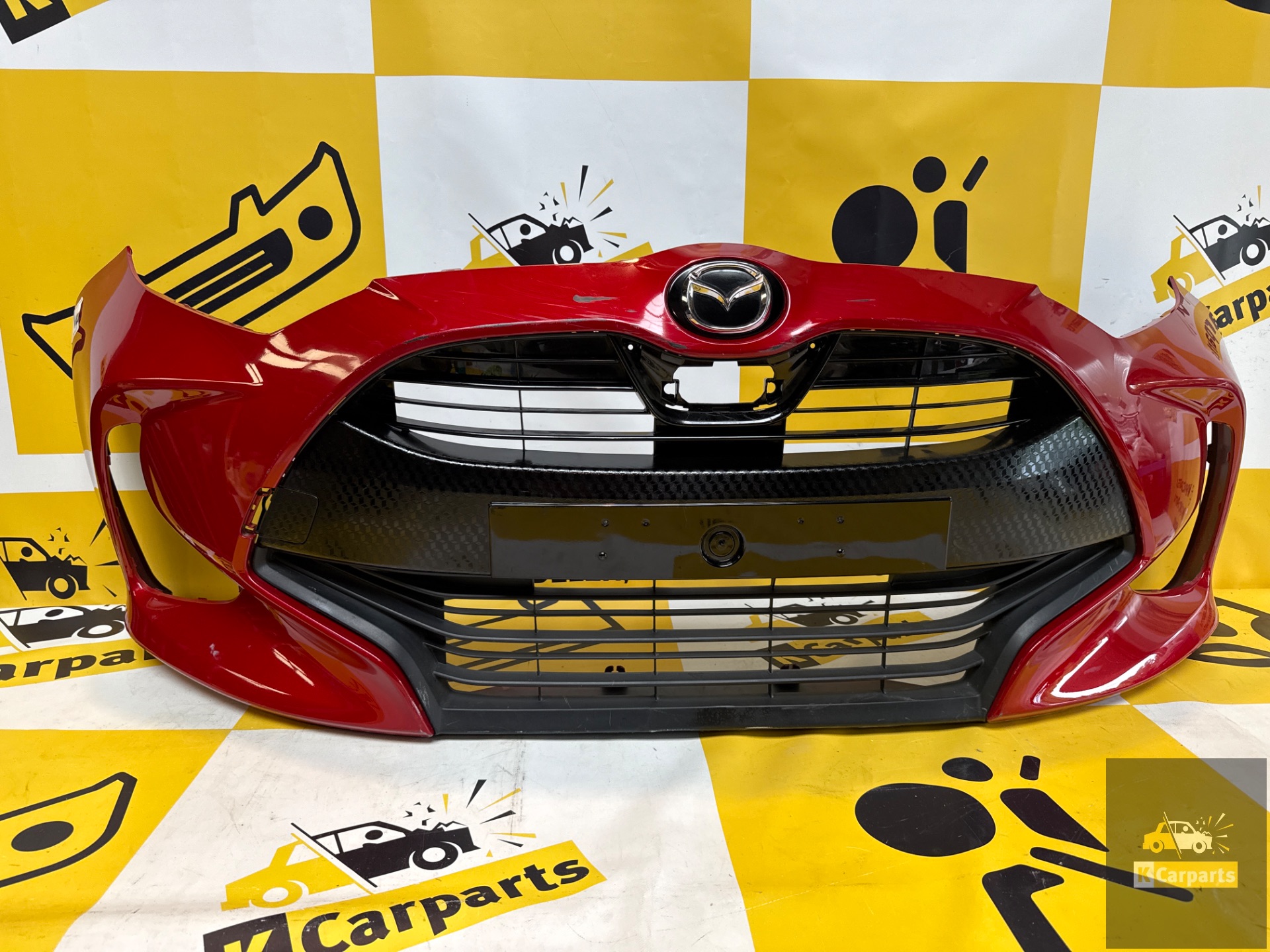 Pare-chocs avant Toyota Yaris/Mazda 52119-K0050