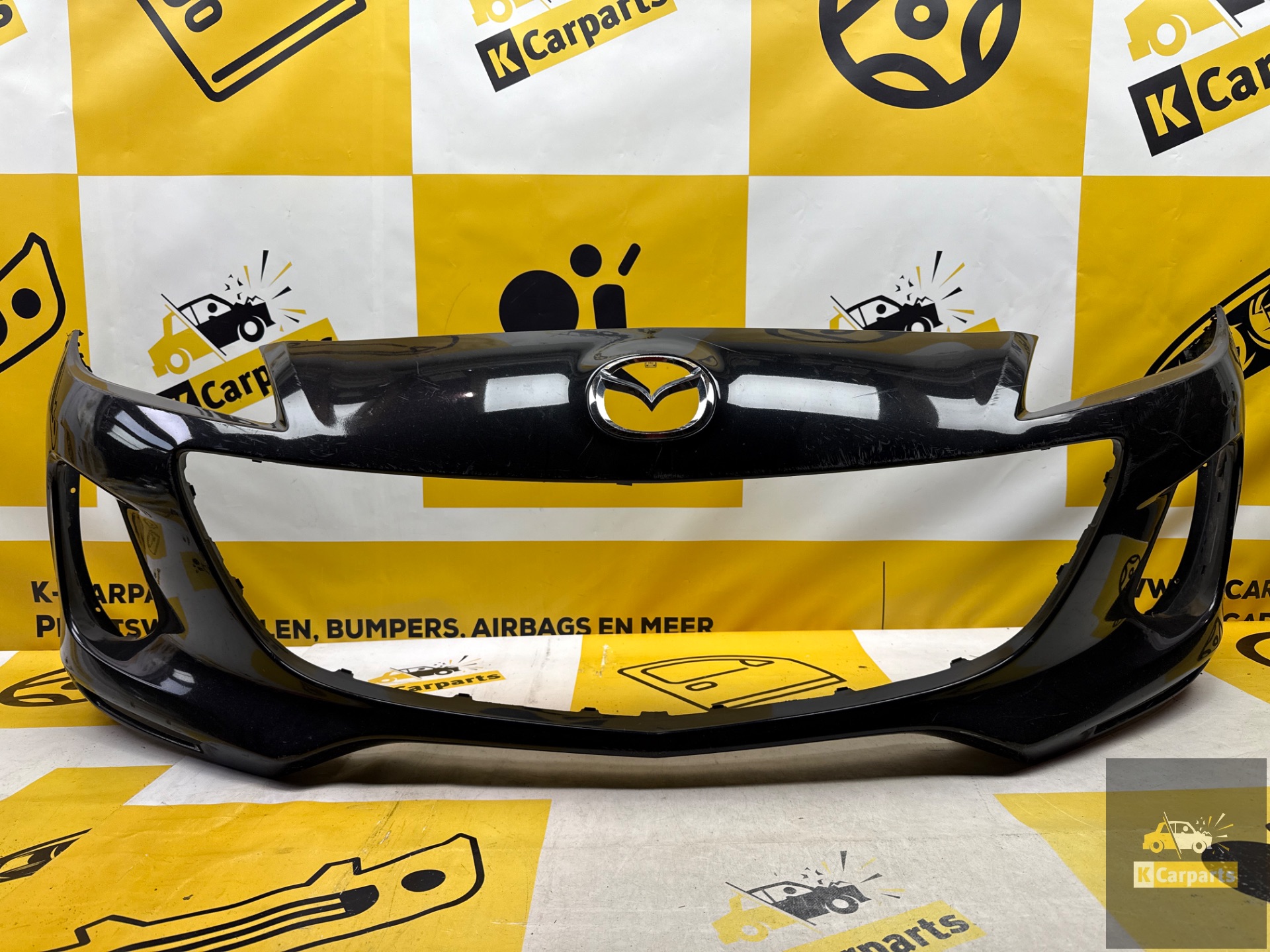 Voorbumper Mazda 3 k3006 origineel bumper